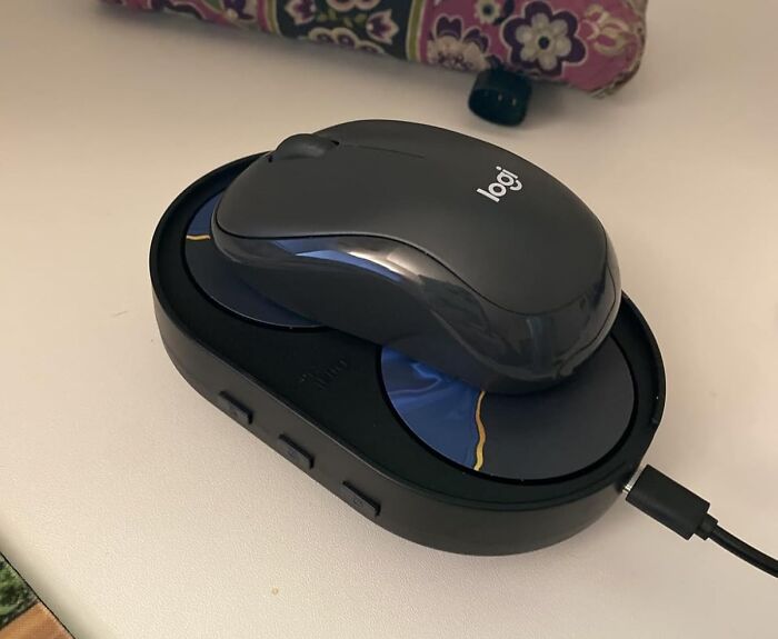Wireless mouse charging dock with a sleek design, one of the everyday finds that fix your annoyances.