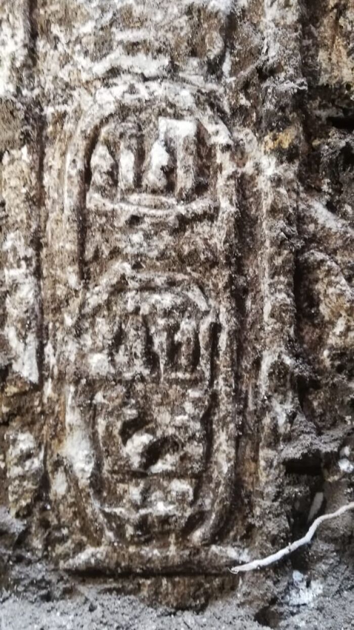 Ancient carved stone artifact with intricate symbols, showcasing a bizarre historical artifact from past civilizations.