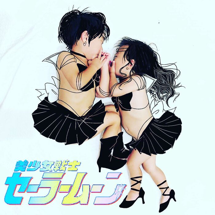 Two kids in black sailor outfits with creative drawings, showcasing a Japanese father of two’s adorable photo art.