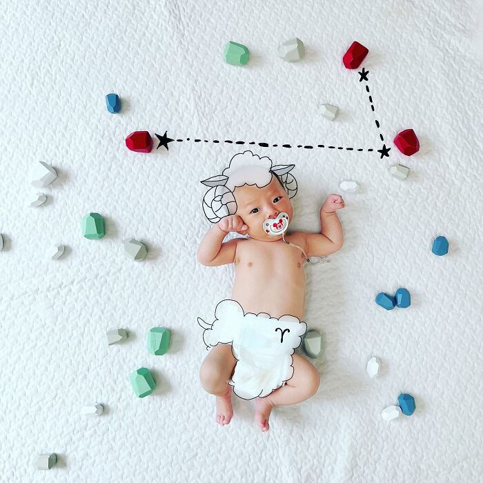 Baby with drawings of sheep horns and wool, art by Japanese father on his kids’ photos creating adorable scenes