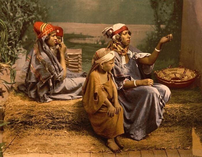 Colorized photo showing people in traditional attire revealing the world's vibrant cultural past and heritage.