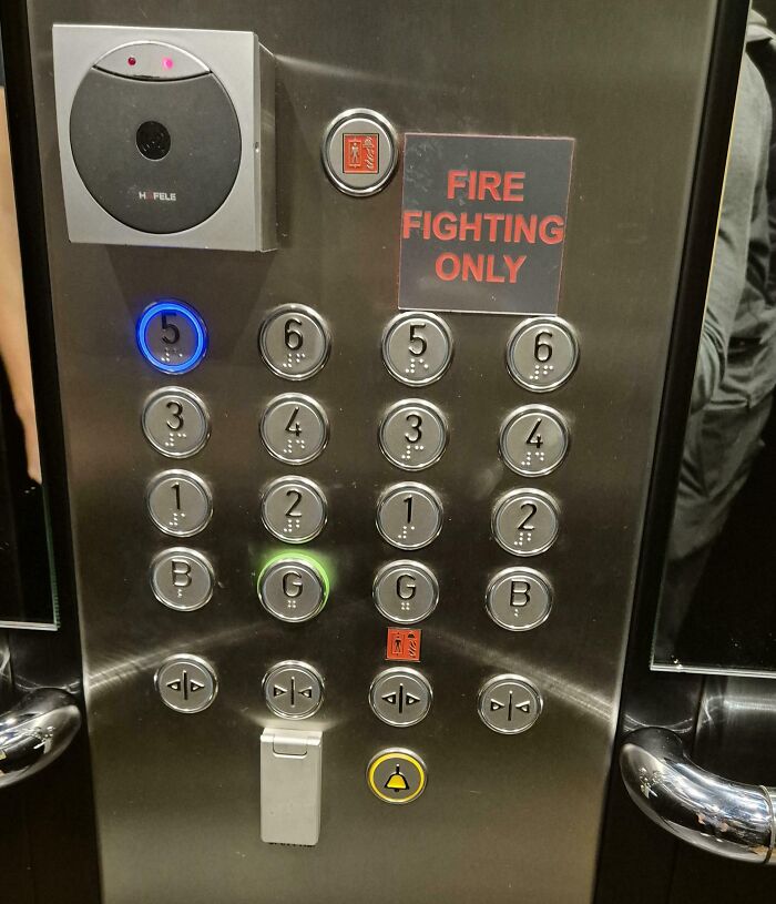 Elevator panel with duplicate floor buttons and confusing layout, showcasing one of the dangerous designs and potential death traps.
