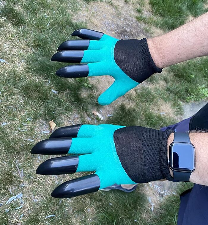 Gardening gloves with claw-like fingertips worn on hands over grass, designed to ease garden's tiny tantrums.