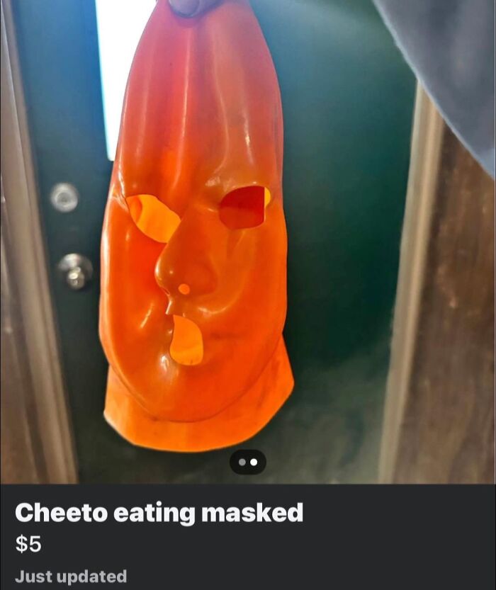 Orange novelty mask shaped like a face resembling a cheeto, listed among wildest things for sale on Facebook Marketplace.