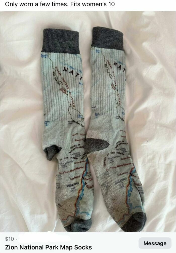 Pair of Zion National Park map socks laid flat on a white surface, listed for sale on Facebook Marketplace.