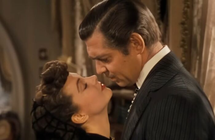 Classic movie scene with two celebrities close together, highlighting controversies around gross hygiene habits.