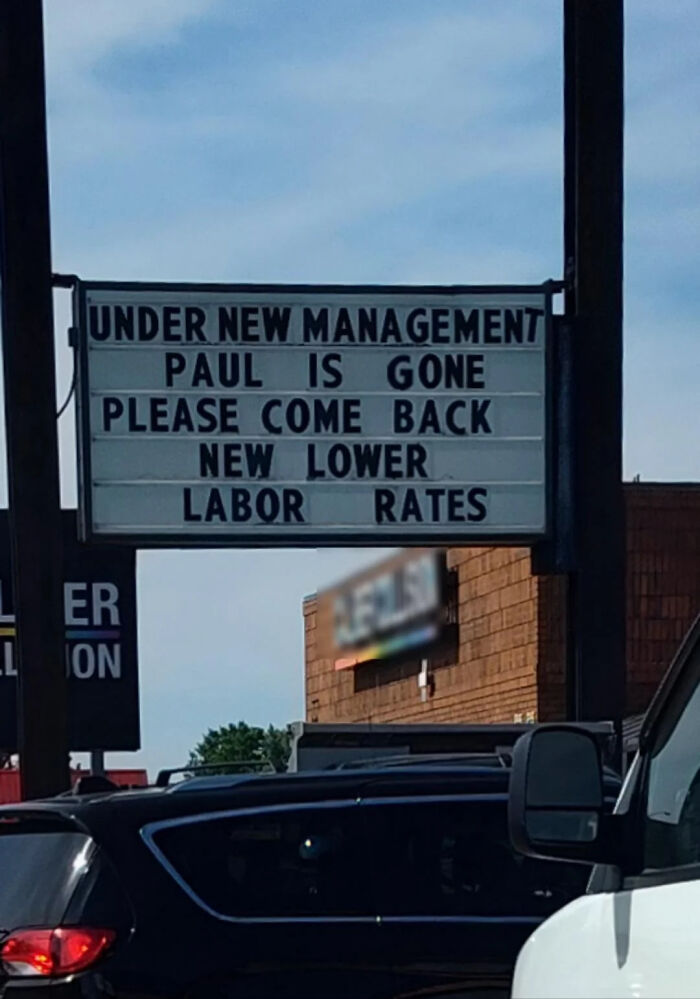 Sign reading under new management Paul is gone please come back new lower labor rates, capturing hilarious main character moment.