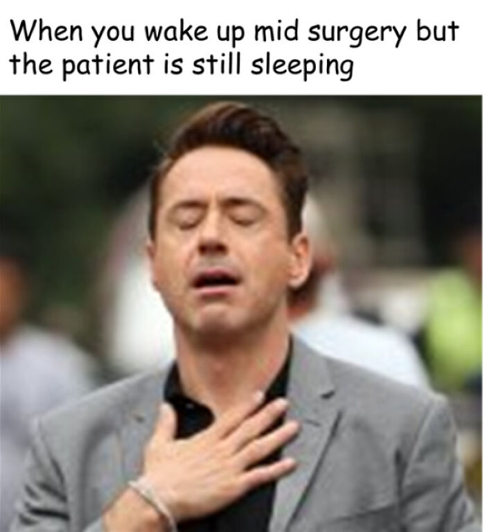 Man in gray jacket with eyes closed and hand on chest, expressing relief in a medical school meme about surgery fatigue.