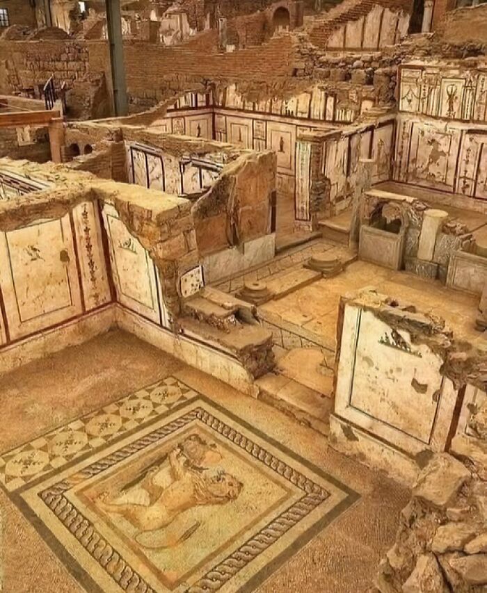 Ancient archeological site with detailed art and mosaics showcasing archeology and art in historical ruins.