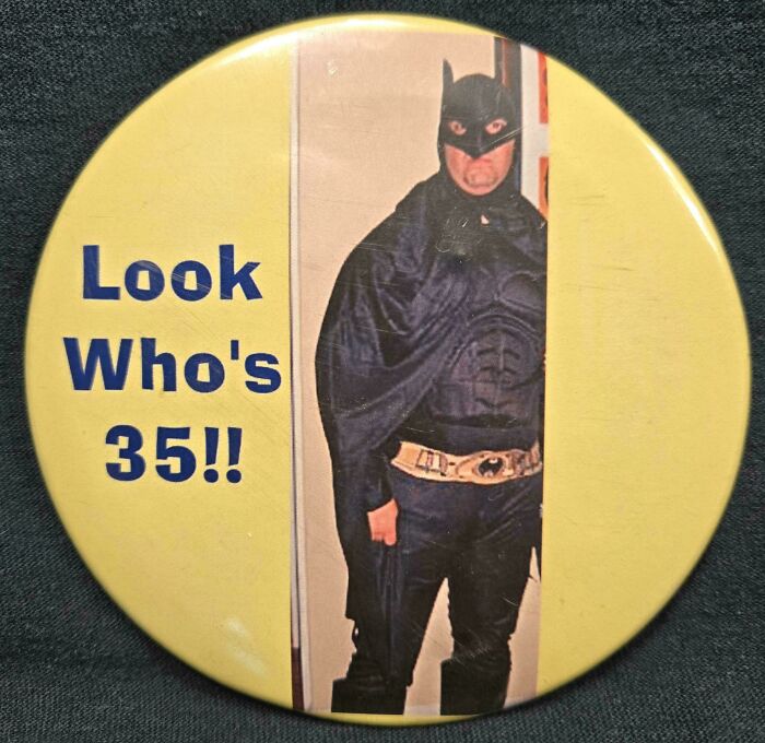 Button featuring a man in a Batman costume with text celebrating a 35th birthday, related to people share found photos.
