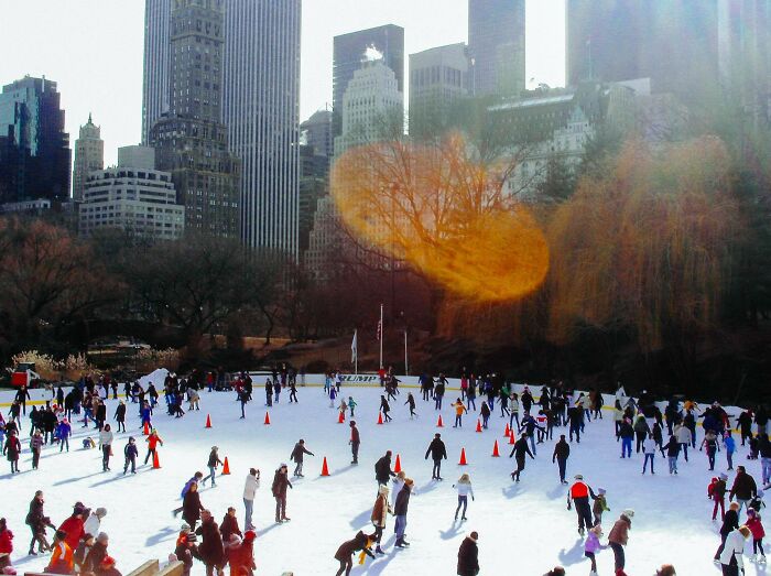 People share found photos of a busy outdoor ice skating rink with city skyscrapers in the background on a sunny day.