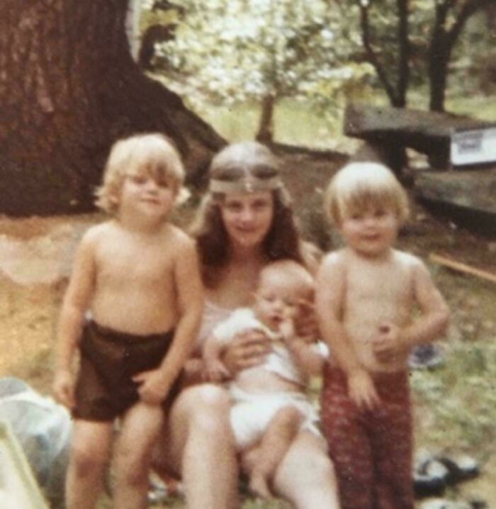 Vintage photo of children and a woman outdoors, showcasing people share found photos from past generations.