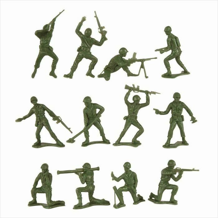 Green plastic army men toys in various poses, evoking nostalgic childhood memories and vintage playtime moments.