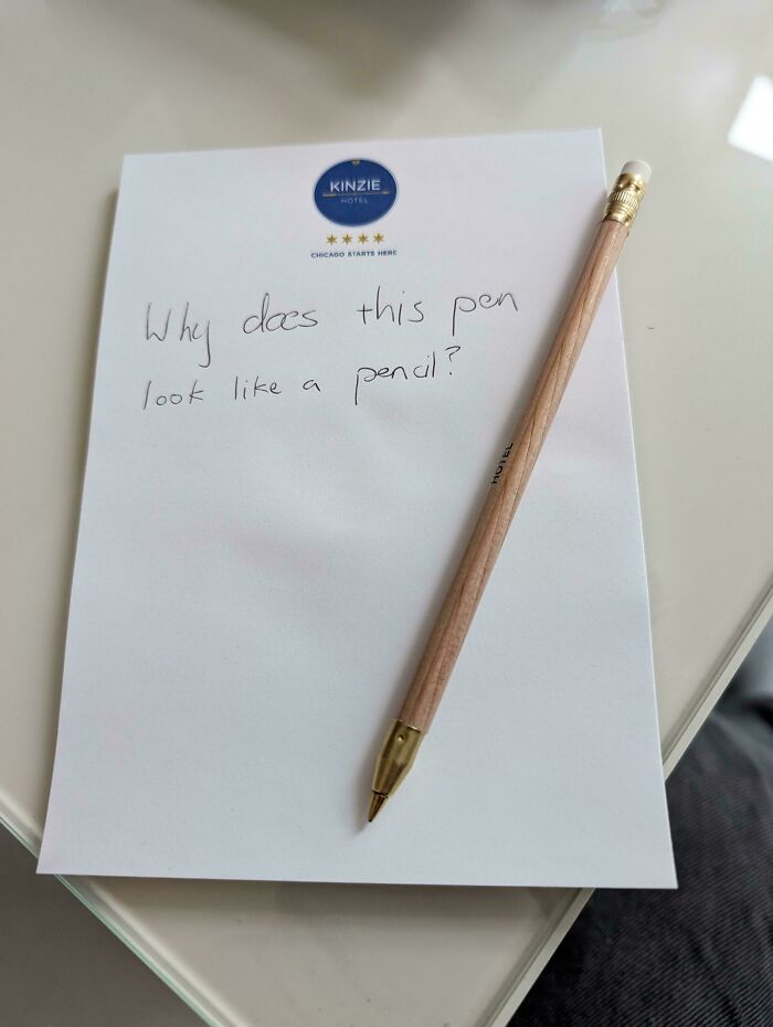 Pen designed to look like a pencil on Kinzie Hotel notepad showcasing creative hotel design decisions.