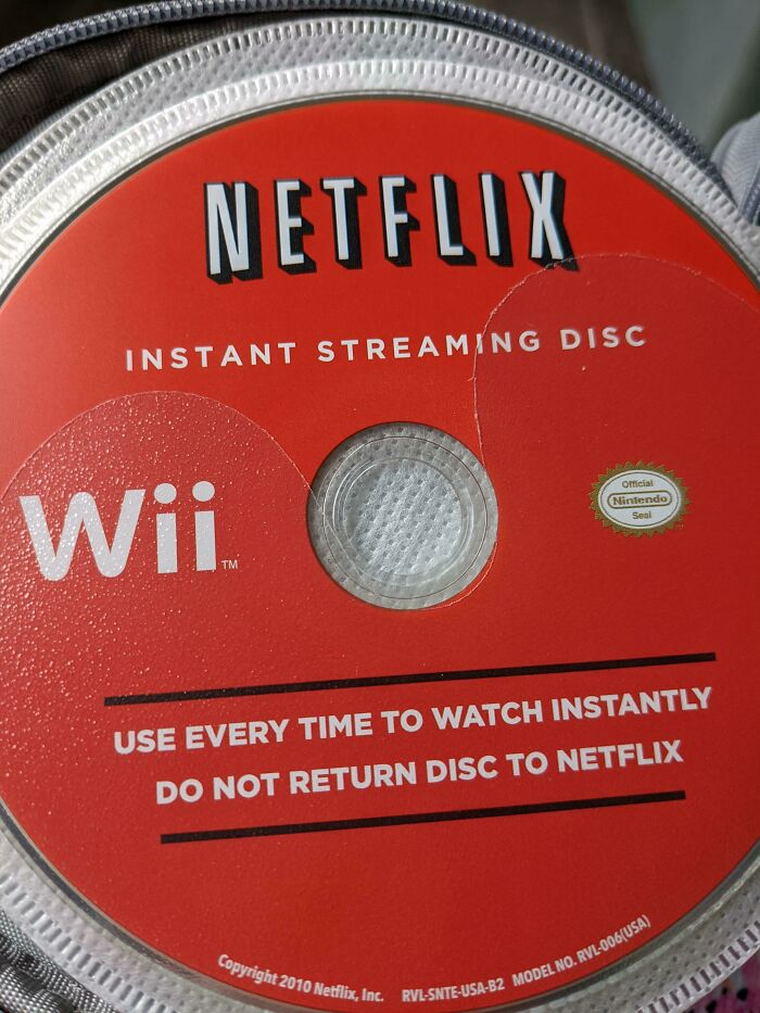 Netflix instant streaming disc for Wii, showing the vintage physical media used before digital streaming became dominant.