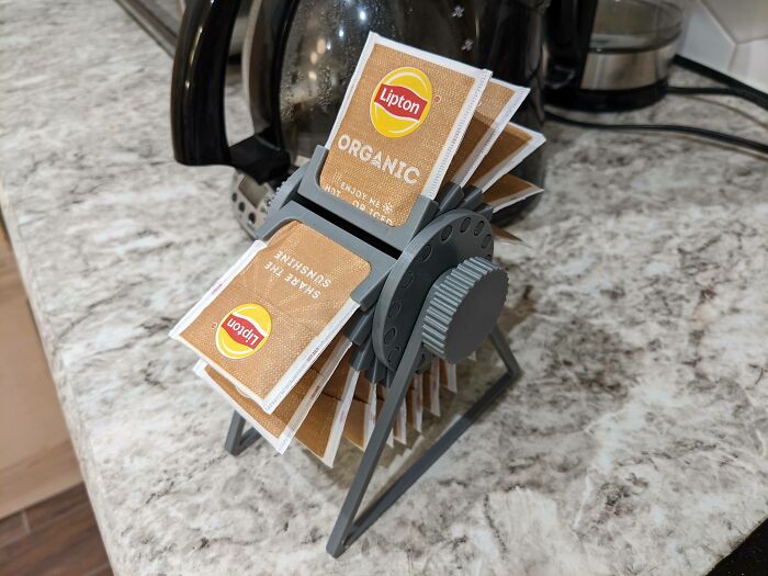 Creative DIY project showing a rotating tea bag holder on a kitchen countertop, blending genius and quirky design.
