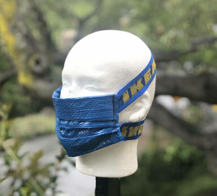 Mannequin head outdoors wearing a blue IKEA strap DIY project face mask showcasing creative design ideas.