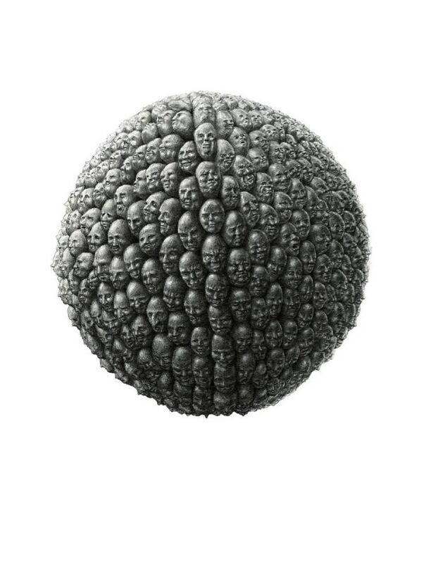 Sphere covered in detailed graphite drawings of unsettling human faces merging together.