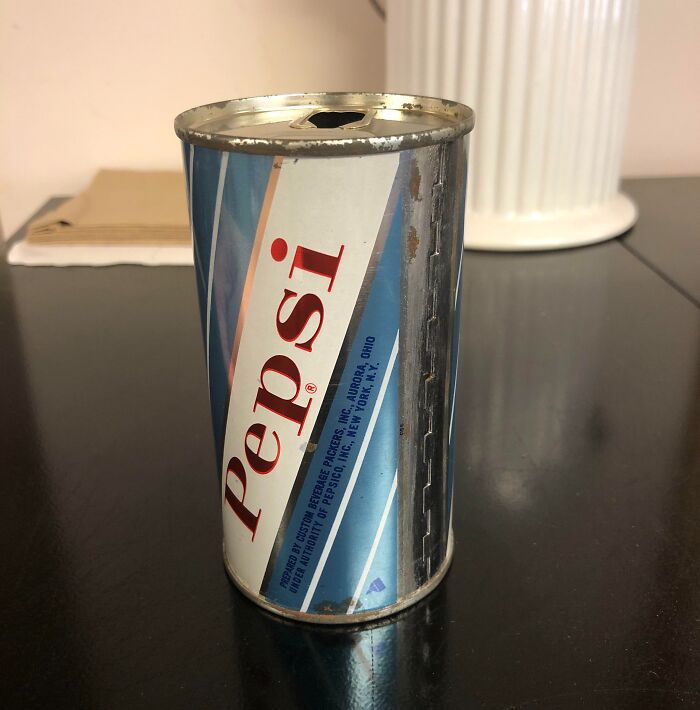 Vintage Pepsi soda can with a classic design, showing how things used to look in past decades.