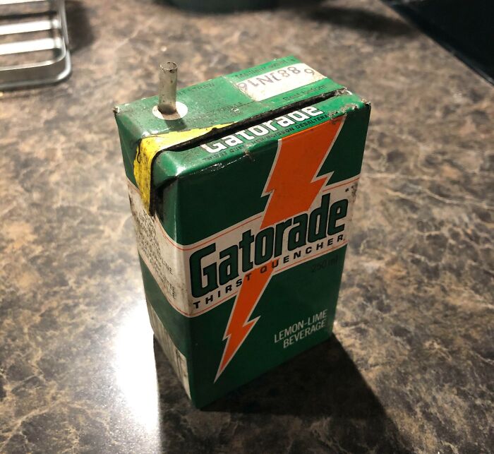 Vintage Gatorade lemon-lime beverage carton with a straw, showcasing how things used to look in the past.