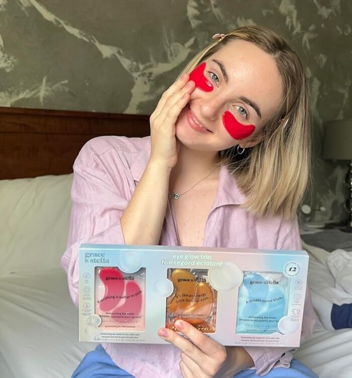 Woman with under-eye patches holding Amazon beauty skincare finds featured in popular wishlists.