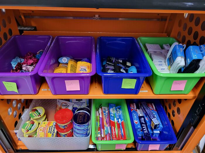 Bins organized with personal care items and snacks, showing teachers' love and care for their students and profession.