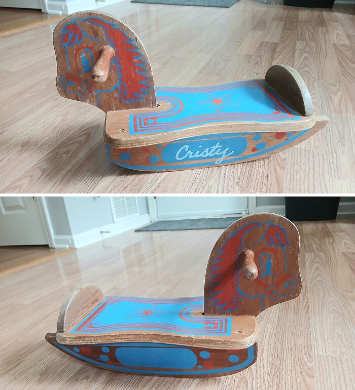 Wooden vintage kids’ rocking toy named Cristy with colorful painted details, a thrifted find that is weird and wonderful.