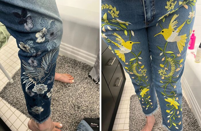 Close-up of thrifted embroidered jeans featuring birds and floral designs, showcasing weird and wonderful fashion finds.