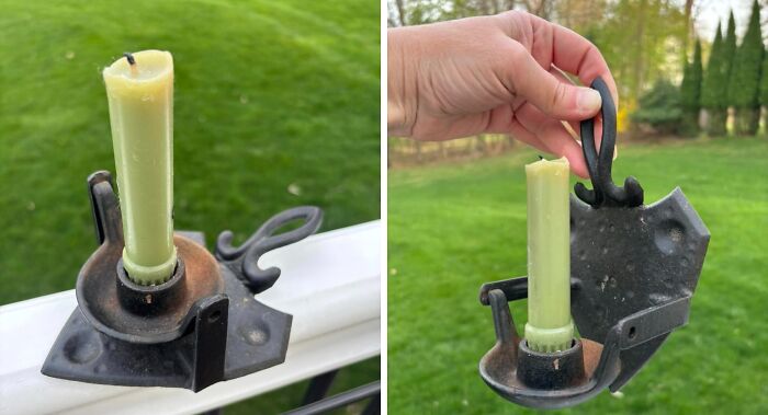 Rustic thrifted metal candle holder with a green candle, showcasing a unique and wonderful vintage design outdoors.