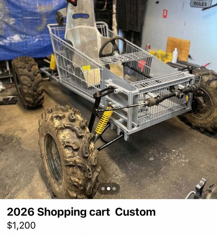 Off-road custom vehicle made from a modified shopping cart with large mud tires and suspension for sale.