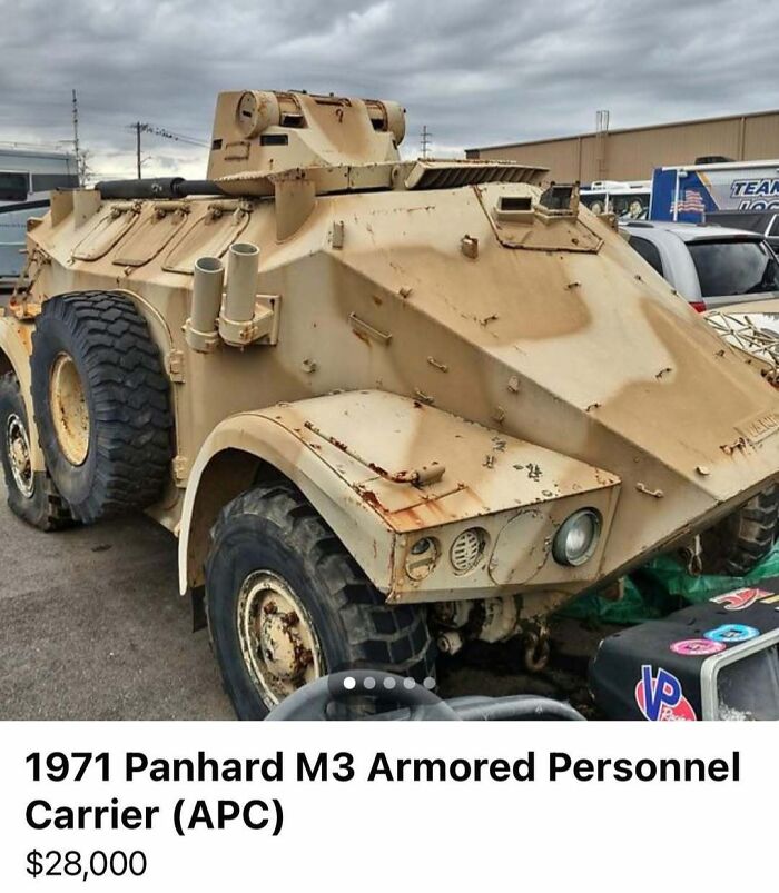 1971 Panhard M3 armored personnel carrier for sale among 103 cars of absolute chaos in a crowded outdoor lot.