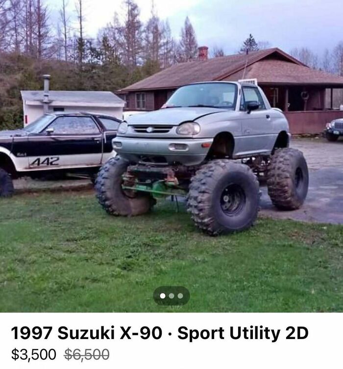 1997 Suzuki X-90 lifted with massive off-road tires, spotted for sale among 103 cars of absolute chaos collection.