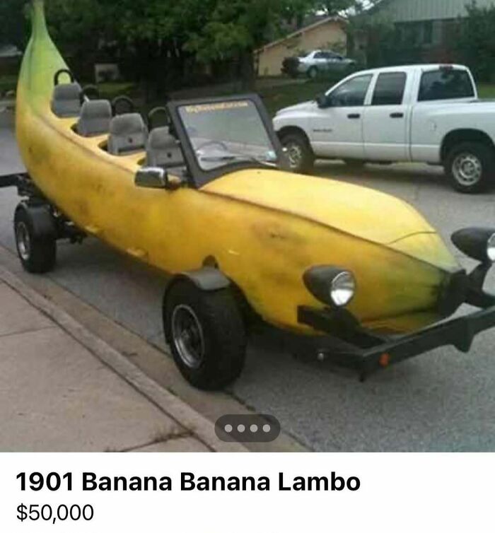 Banana-shaped car with seats and headlights parked on a street, an example of chaotic cars spotted for sale.