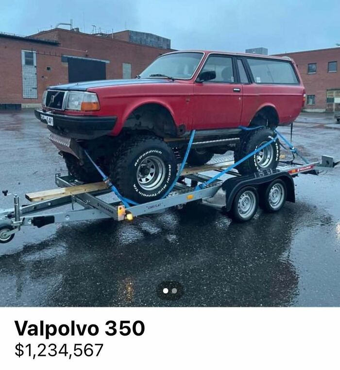 Red Valpolvo 350 with oversized off-road tires secured on a trailer, featured among cars of absolute chaos for sale.