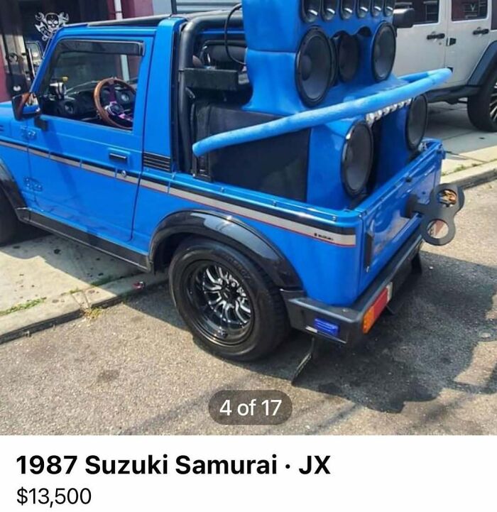Blue 1987 Suzuki Samurai with large custom speaker system in the back, one of the cars of absolute chaos spotted for sale