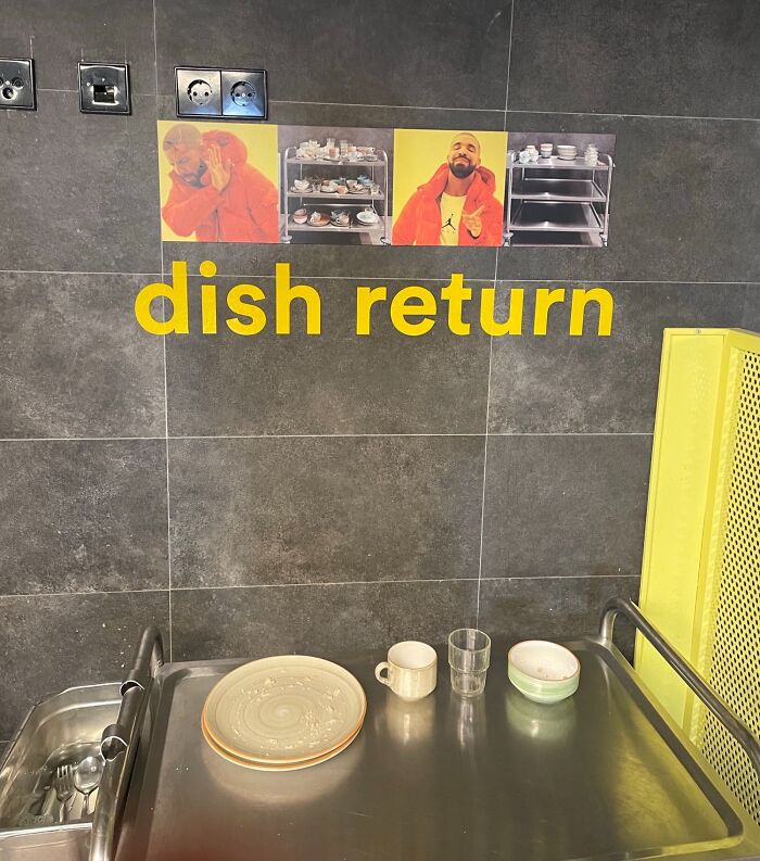 Dish return area with creative hotel design using meme images to show proper plate and dish placement.