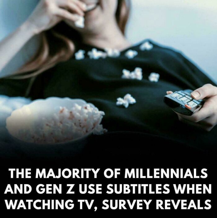 Person holding remote and eating popcorn with popcorn scattered while discussing Gen Z memes usage habits from survey.
