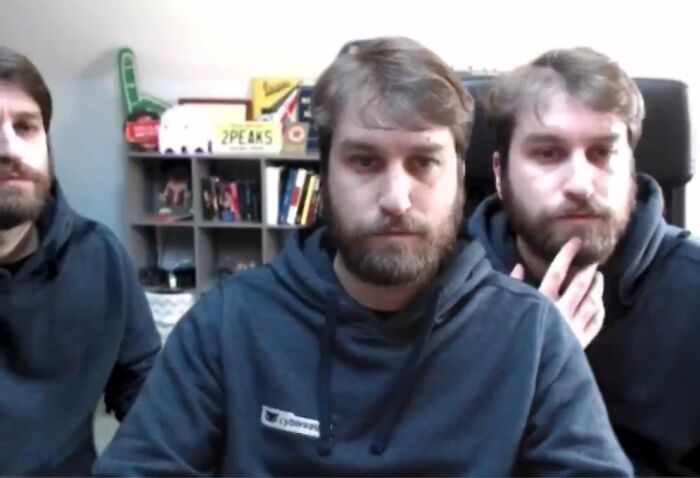 Three men with beards wearing dark hoodies in a casual indoor setting illustrating funny work-from-home memes.