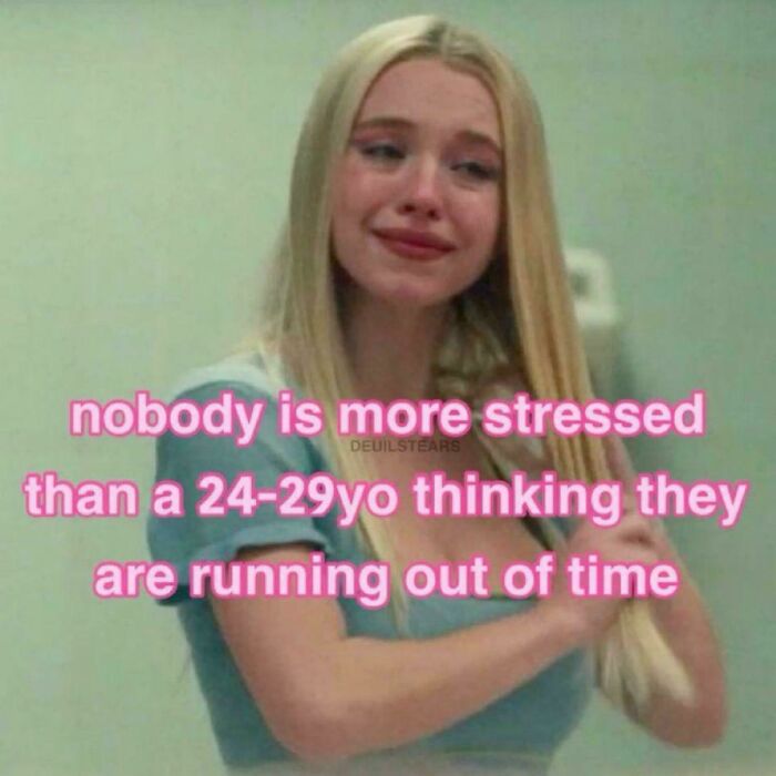Young woman with long blonde hair looking stressed, representing feeling of running out of time in Gen Z memes.