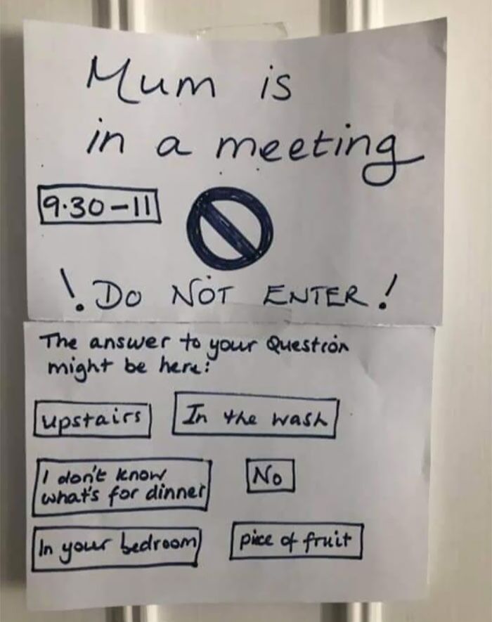 Handwritten work-from-home meme sign showing meeting time and funny answers to common questions.