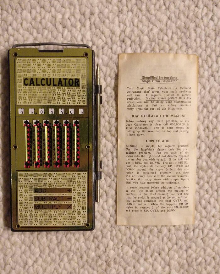 Vintage calculator and instruction sheet illustrating how things used to look with old mechanical math tools.