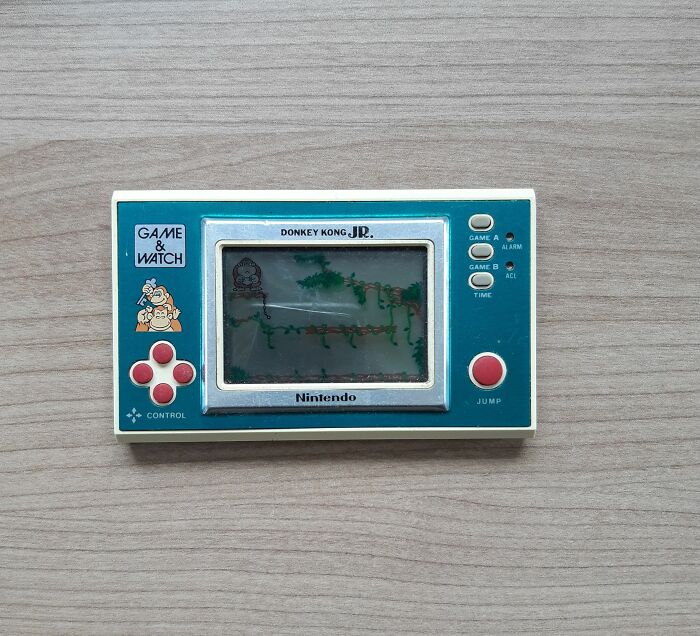 Vintage Nintendo Game & Watch handheld featuring Donkey Kong Jr, showcasing classic retro gaming from how things used to look era.