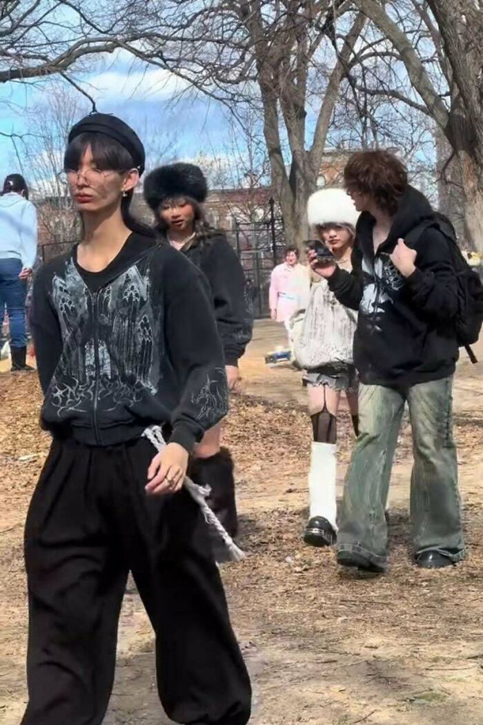 Young people showcasing evolving fashion styles outdoors, illustrating ways things have changed through the years online.