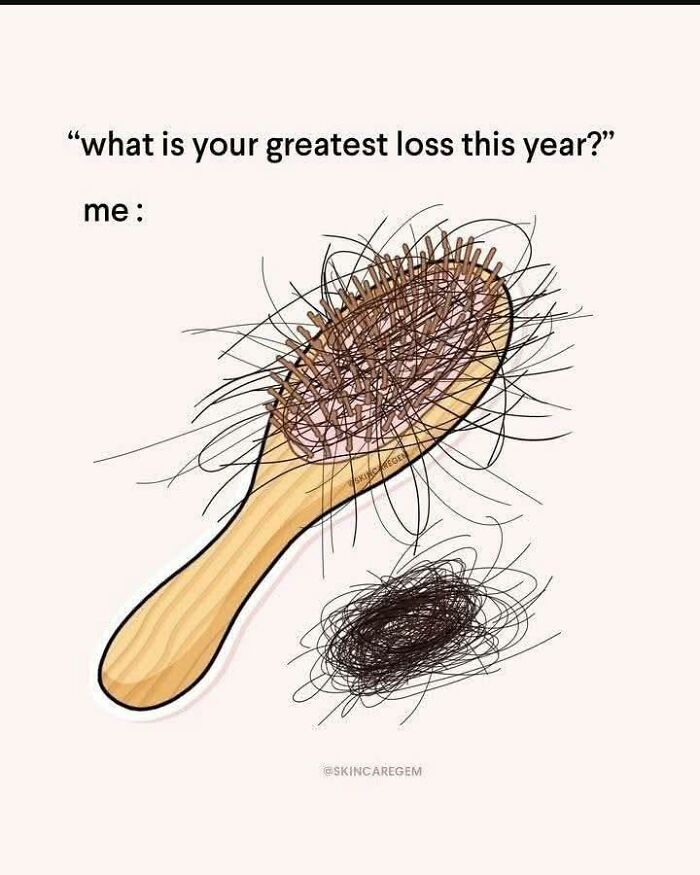 Hairbrush filled with fallen hair strands representing a relatable cute and wholesome post about hair loss this year.