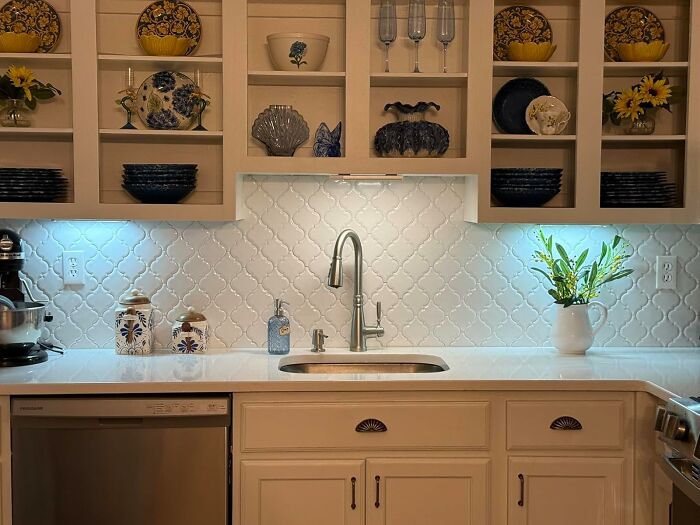 Modern kitchen with stylish backsplash and decorative items, showcasing popular Amazon finds for home and kitchen decor.