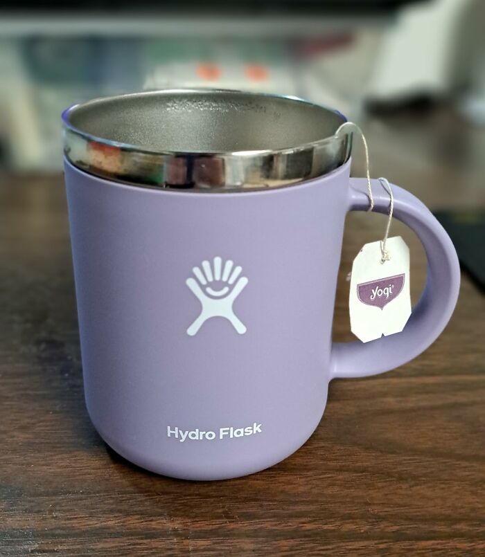 Purple Hydro Flask mug with tea bag tag on handle, featured in Amazon Memorial Day bargains for great deals.