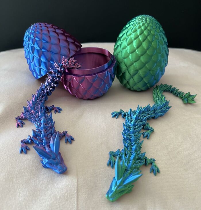 Colorful dragon figurines and scale-patterned egg containers displayed as unique bestsellers pandas are buying right now.