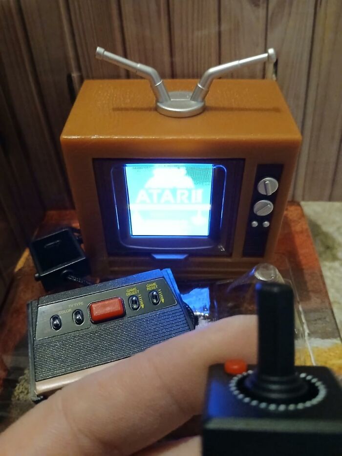 Retro Atari gaming console with joystick and vintage TV screen, showcasing nostalgic Amazon tech finds and gadget appeal.