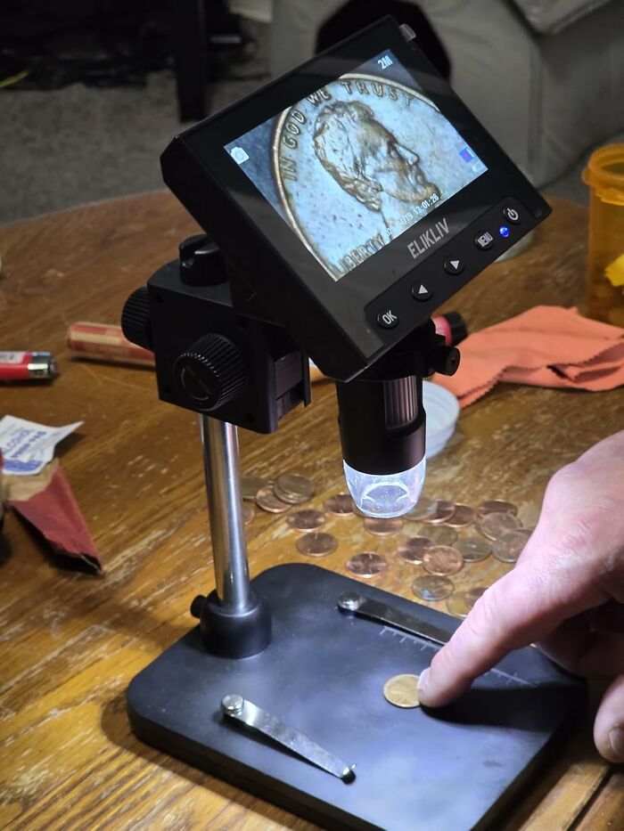 Digital microscope showing a close-up of a coin, one of the weirdly wonderful finds for collectors.