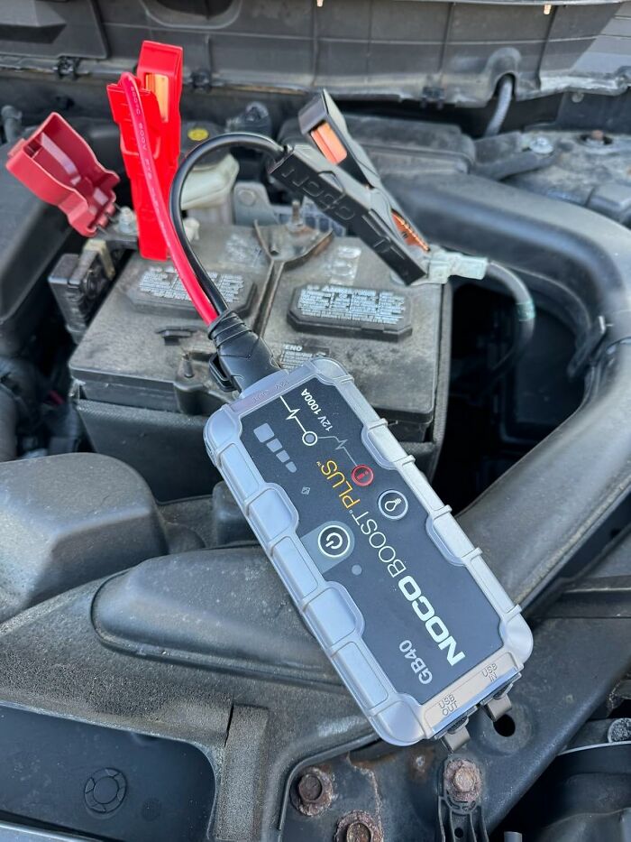 Compact NOCO Boost Plus car battery charger connected to a battery, one of the top Amazon finds on wishlists right now.